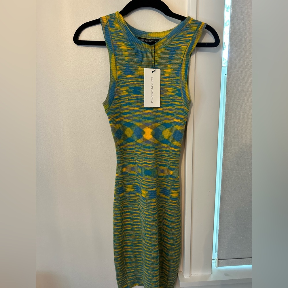 A tie die color dress that fits your body shape nicely